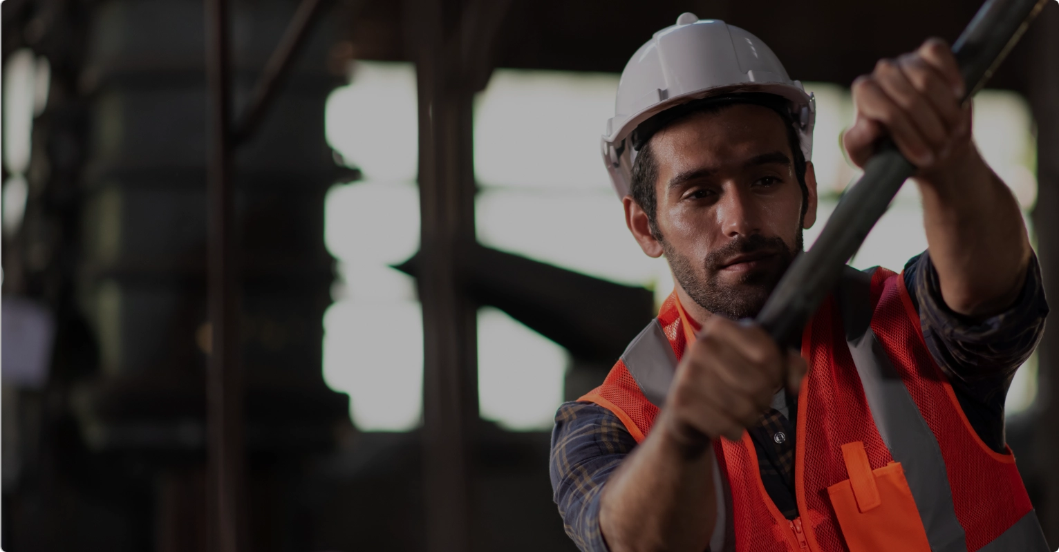 Construction worker laying bricks on a job site